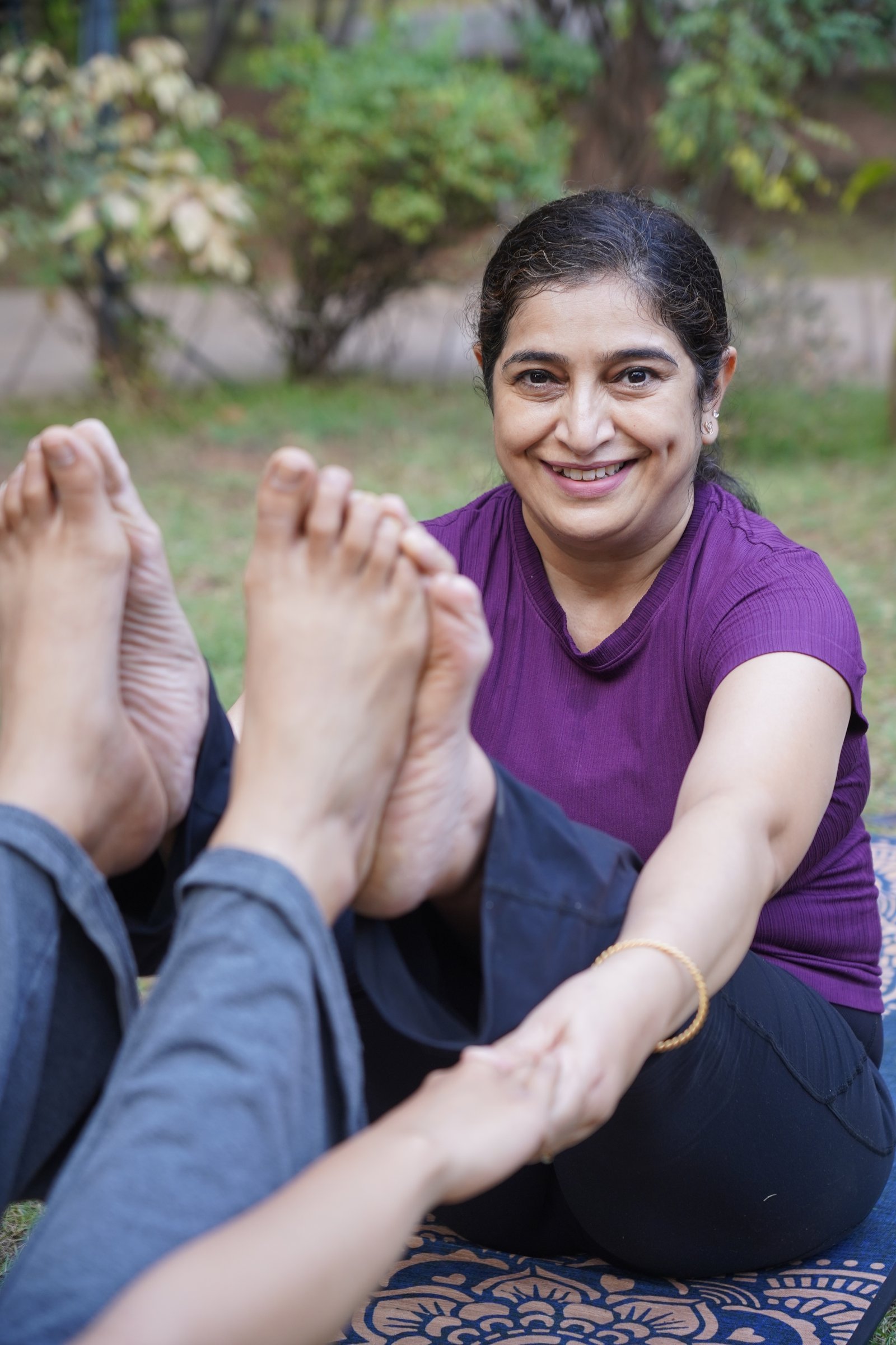 Sangeeta practicing yoga